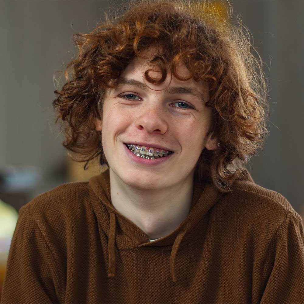 Teenager with Braces Smiling